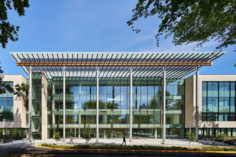 Glass entrance and canopy of the 1063 Block building in Olympia