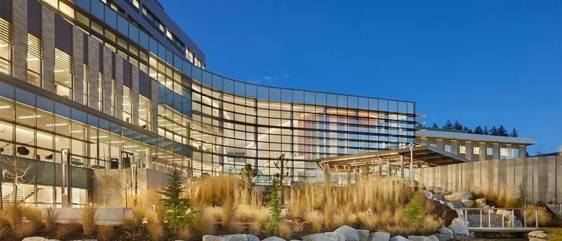 St. Michael Medical Center glass lobby at dusk